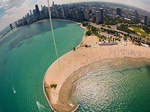 kite flying above north avenue beach in chicago with gopro hd hero2 camera on a late spring day just before summer with views of the chicago skyline and navy pier to the south
